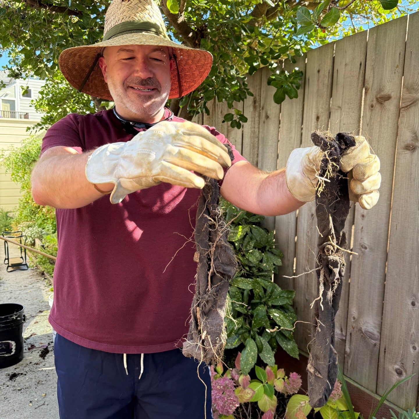 Yup, that's me, and that is a pair of socks I exhumed from the garden. You never know what mysteries lie just below the surface.